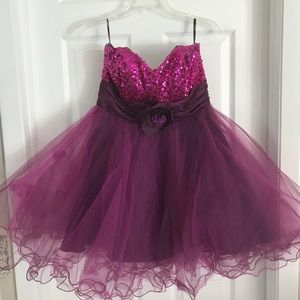 Purple sequined and tulle dress with flower
